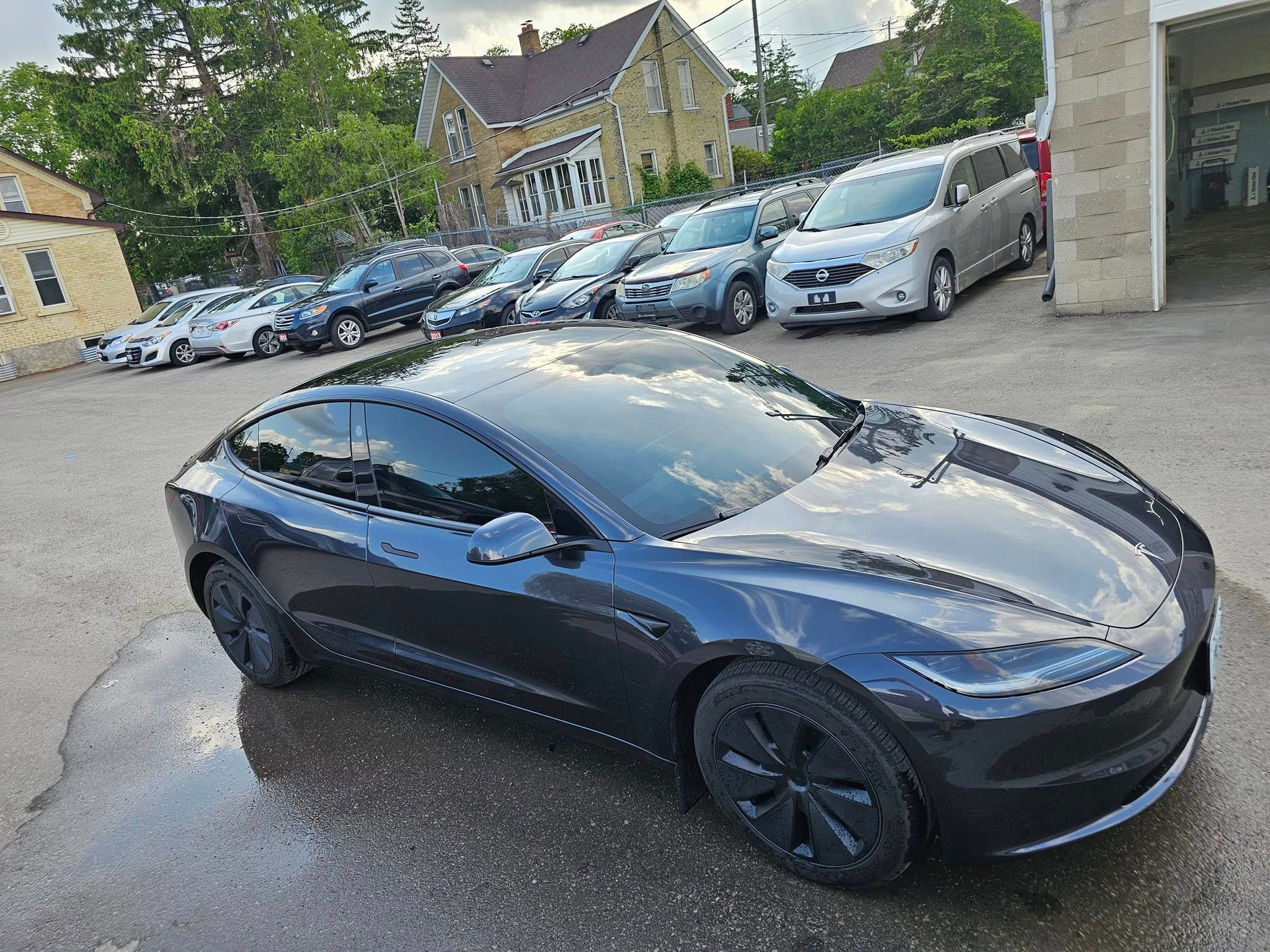 Black Tesla at Azone Car Care. Professional auto care from a trusted local shop.