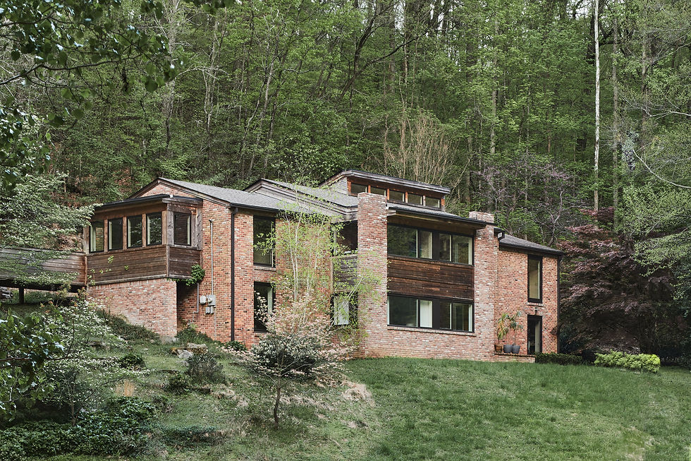 two story contemporary brick house; photo credit: joseph bradshaw