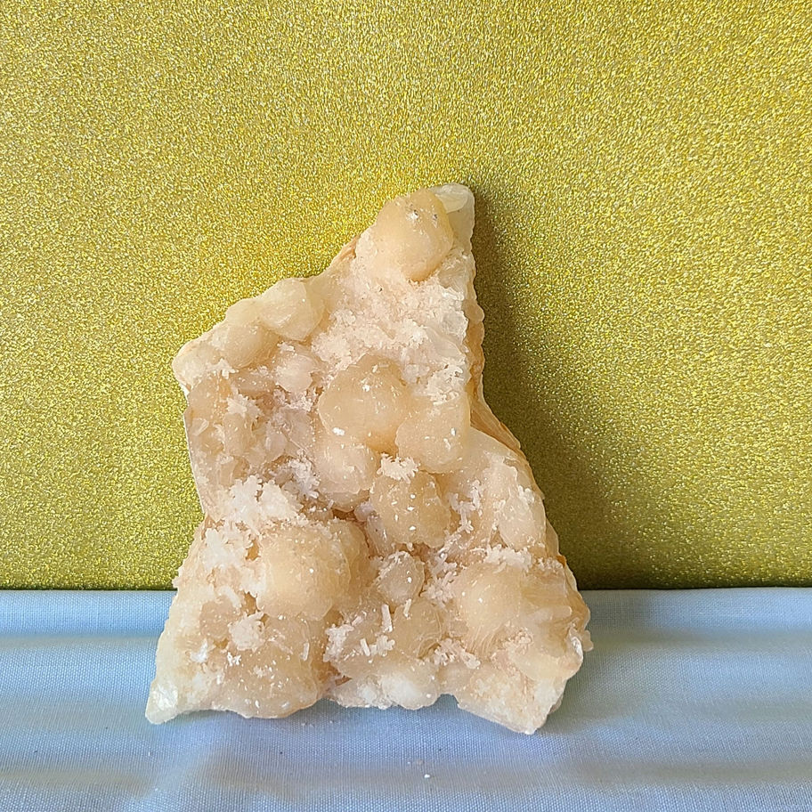 Zeolite cluster. multiple facets pointing in different directions