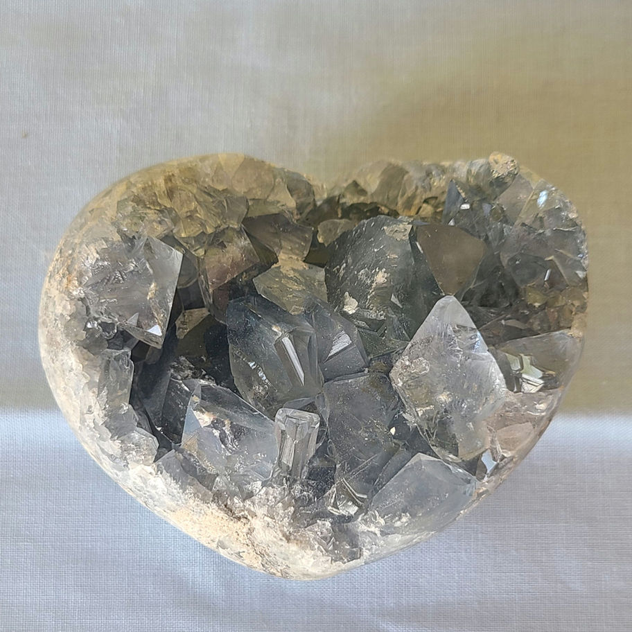 Blue Celestite cluster. multiple facets pointing in different directions heart shaped