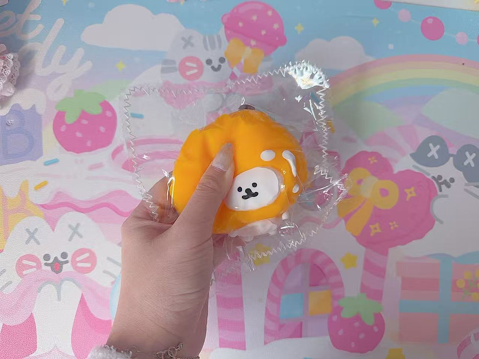 Thumbnail: Sunny Orange Bear Taba Squishy