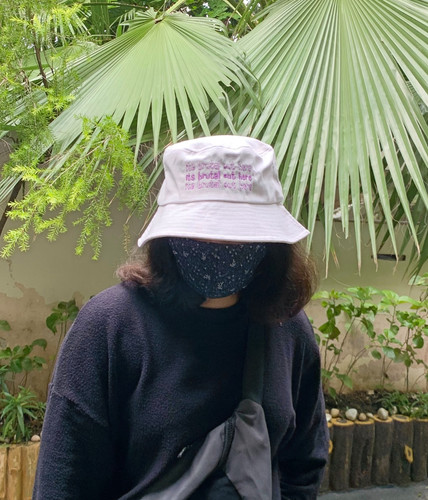 its brutal out here bucket hat 