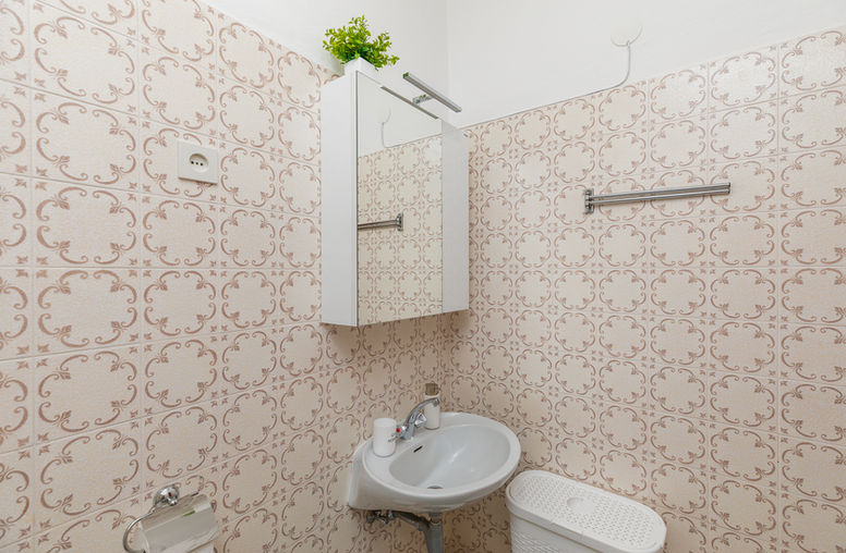 Private bathroom with shower in Apartment 1 at Apartments Bosiljka.