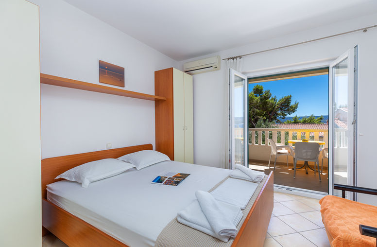 Sleeping area with natural light in Studio Apartment 1, Medići.