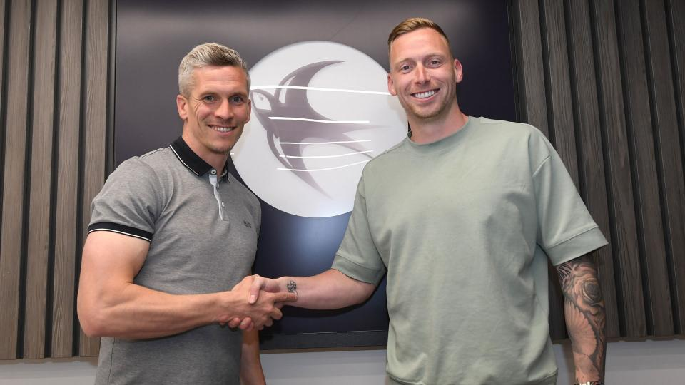 Ryan Allsop with Steve Morison.