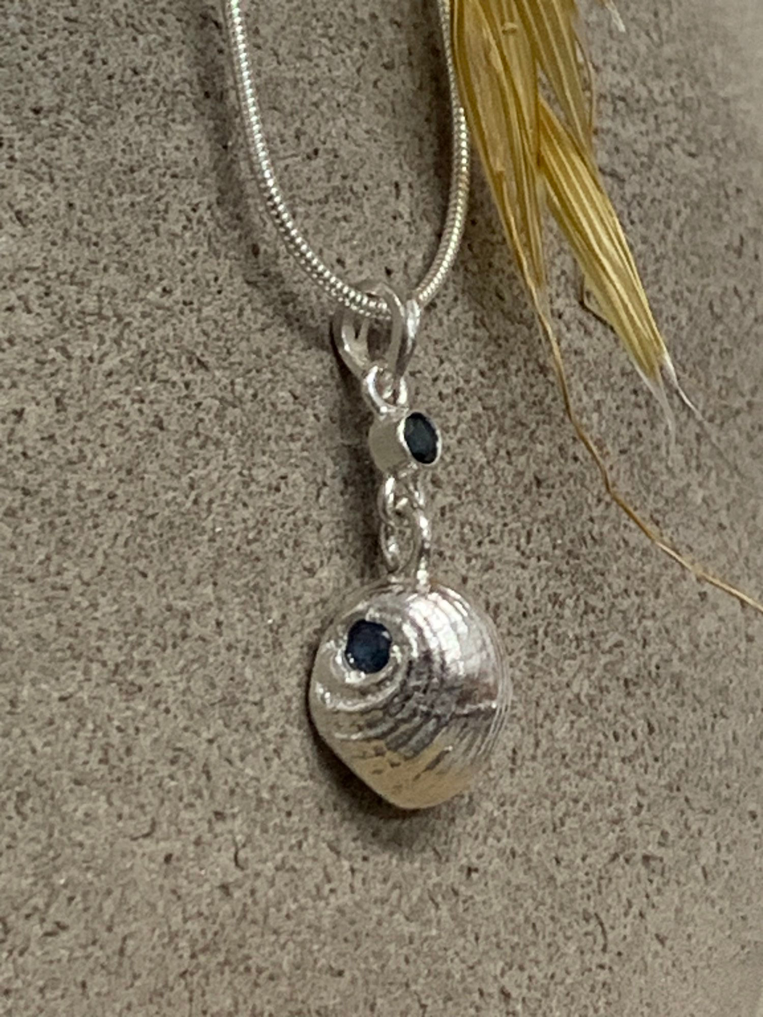 Sapphire seashell pendant