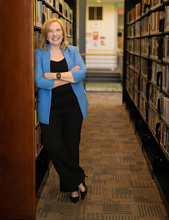 LY Library Standing in Stacks.JPG