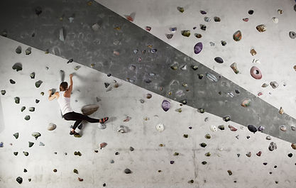 Woman Wall Climbing