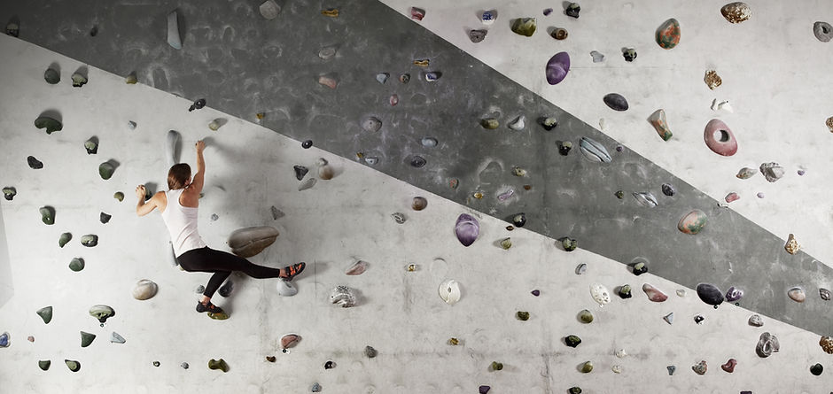Woman Wall Climbing