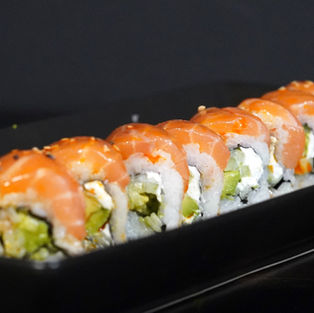 Philadelphia Roll $15.99
Inside: Cucumber, avocado, cream cheese Outside: salmon, avocado & house sauce