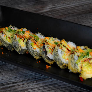 CILANTRO ROLL $20.99
Inside: spicy tuna, spicy crab, cream cheese Outside: spicy mayo, eel sauce, cilantro sauce, green onion, masago