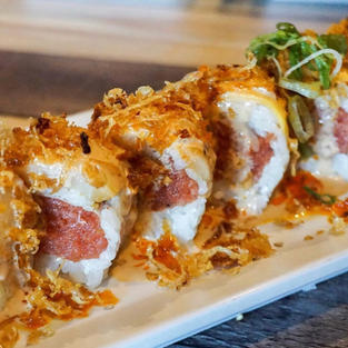 SUMMER ROLL $13.99
Inside: spicy tuna, cucumber Outside: white tuna, mango, crispy onion, house sauce wrapped in soy paper