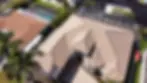 Aerial view of a house with a tile roof, roofing services Orlando Florida