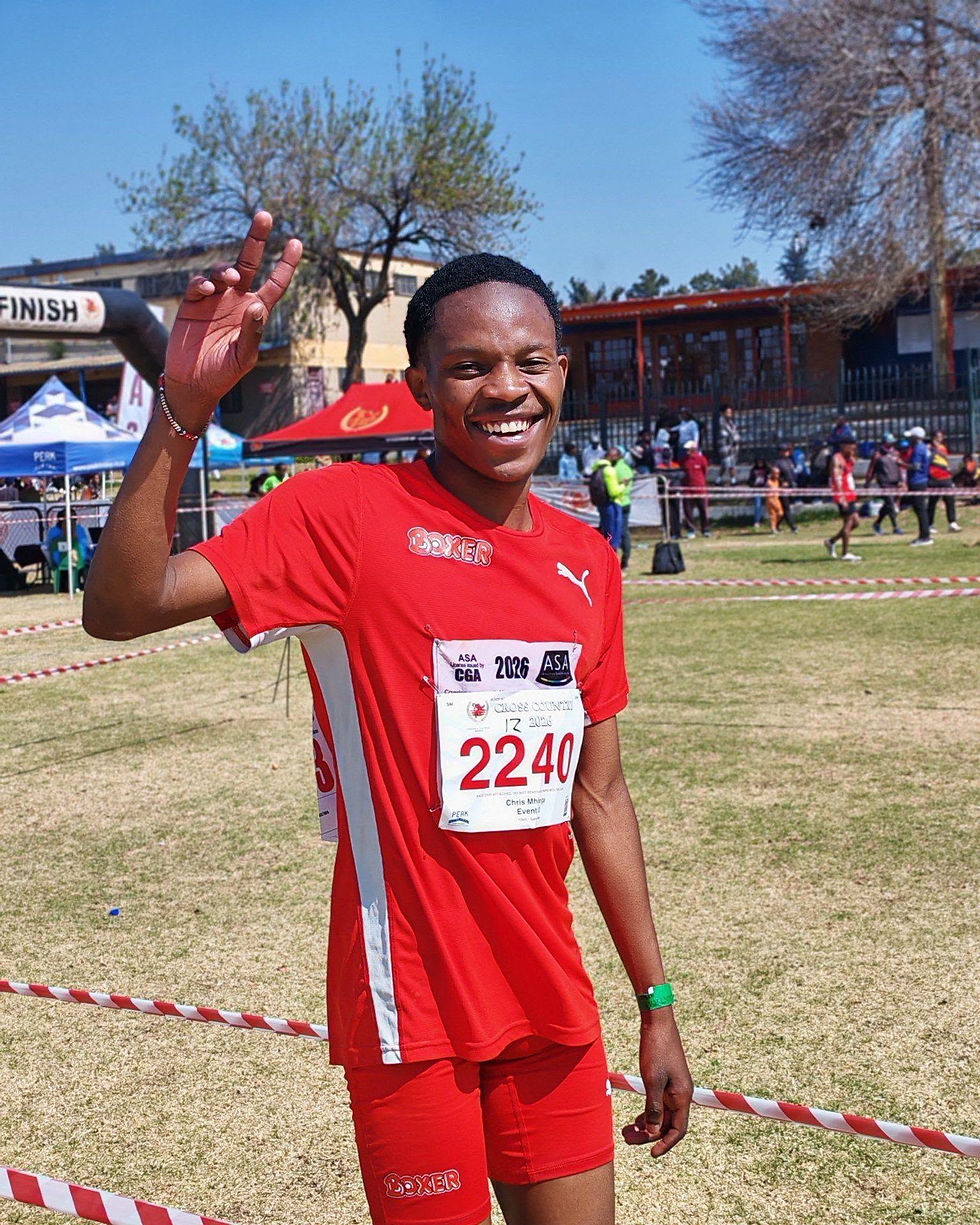 Mhlanga smiles after winning the men's 10km race only for Mokoena to be declared CGA Champion. Photo Credit: CGA Media.