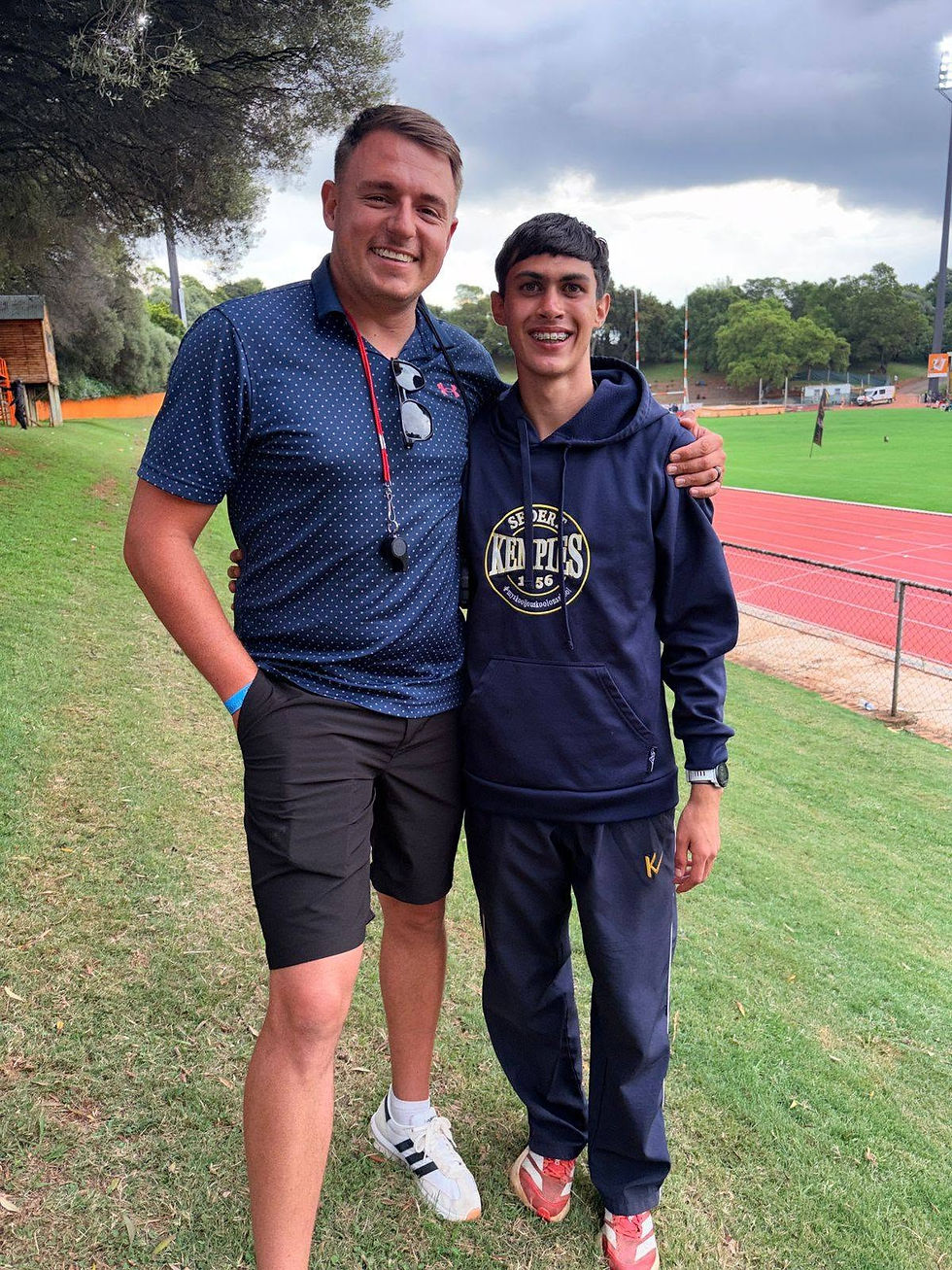 Bekker poses for a photo with his coach Michael van Aswegen. Photo Credit: Supplied.
