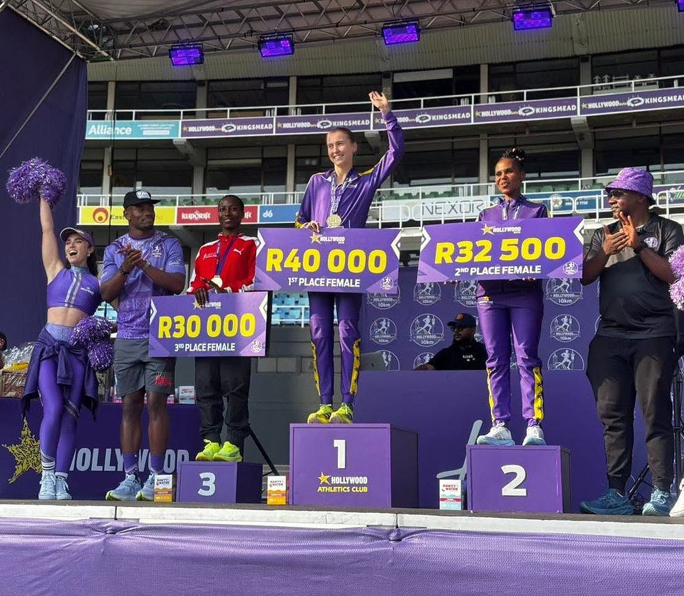 Mailula on the podium after taking third position at the Hollywoodbets Durban 10km on 30 August, 2026. Photo Credit: Hollywoodbets Durban 10km.