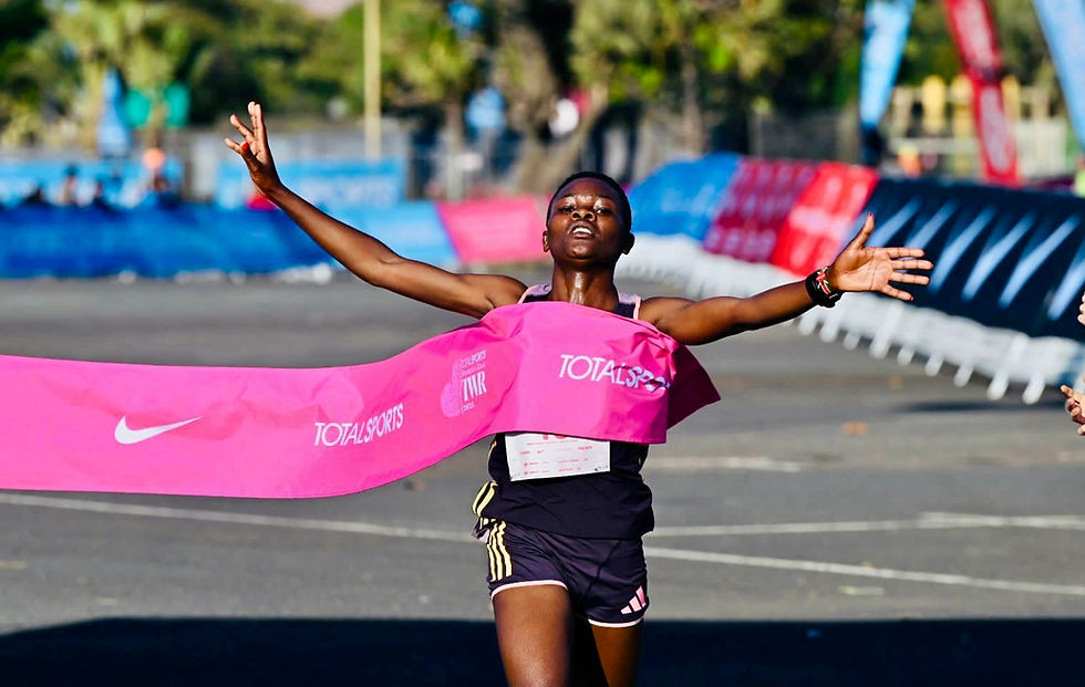 Njoki delivers the first ever sub 30:30 10km run by a woman on African soil. Photo Credit: Anthony Grote.