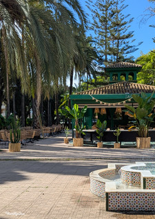a park cafeteria beneath a green awning