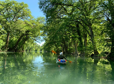 Me paddling under the trees.jpeg
