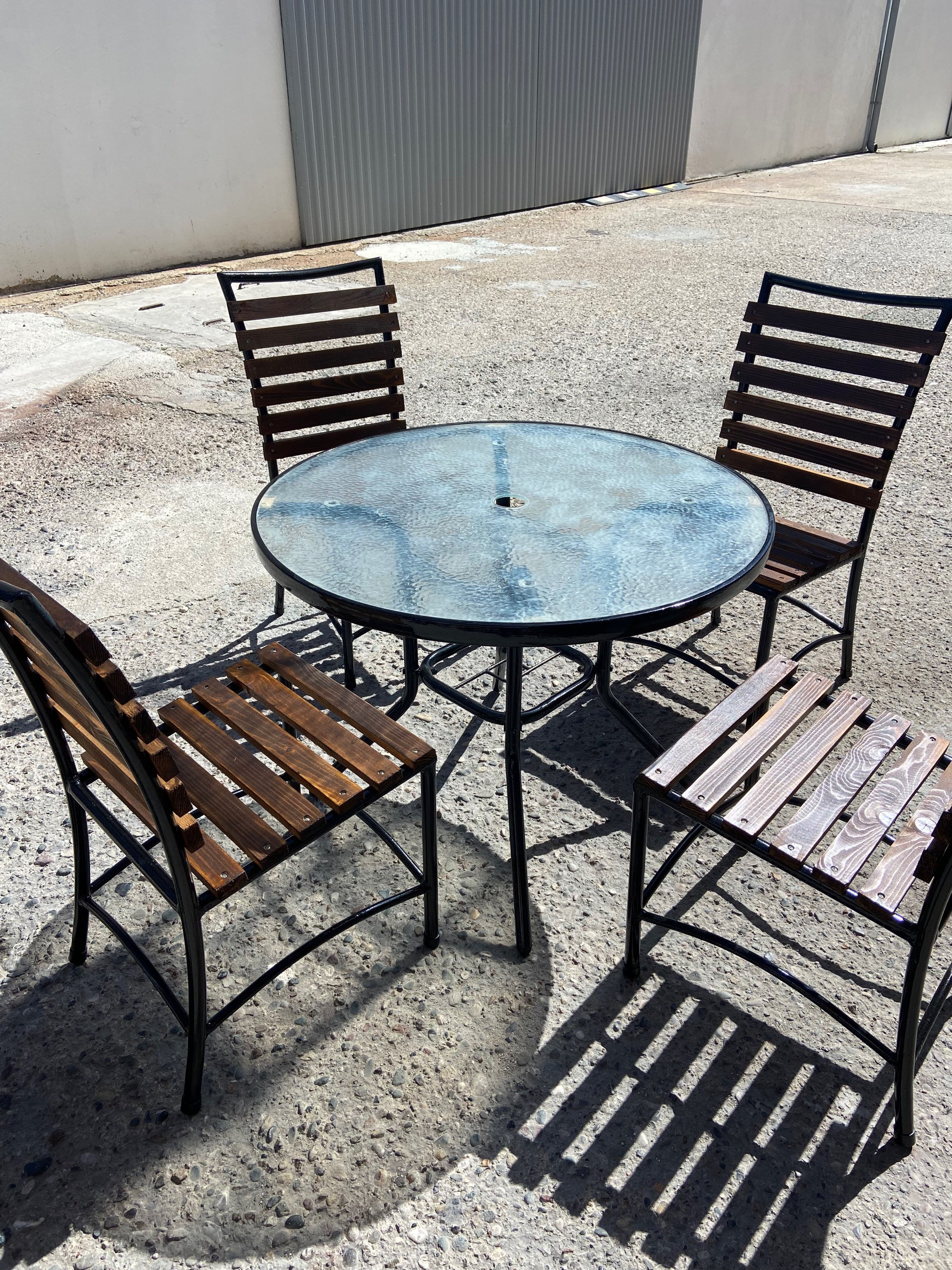 Outside table & 4 hardwood refurbished chairs with cushions 
