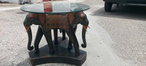 Thumbnail: Unusual carved elephant with round glass top (65 x 55) €245