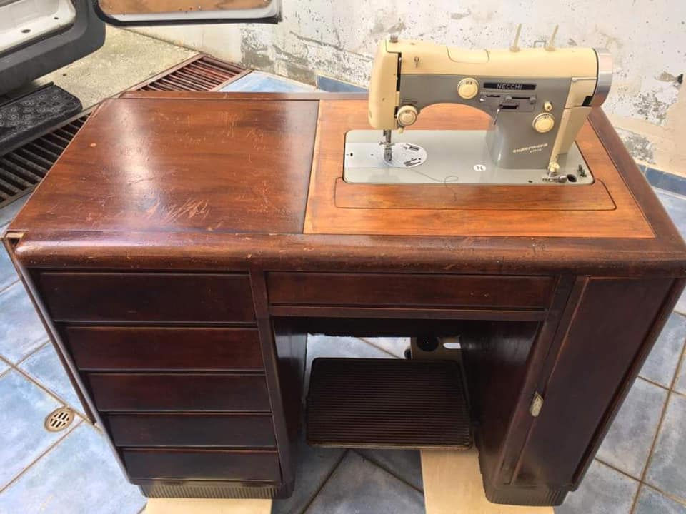 Antique sewing desk with sewing machine