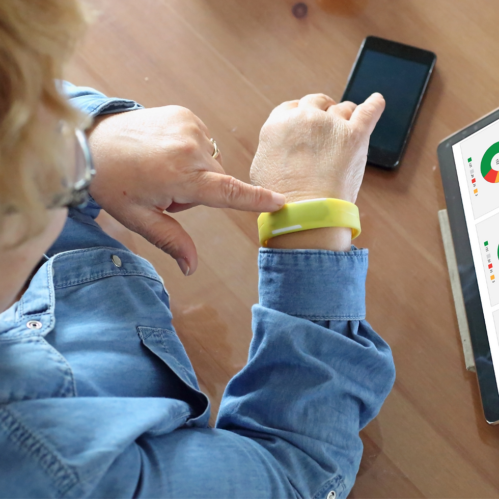 Older woman using wrist tracker