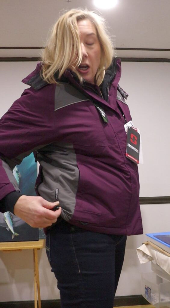 Striker Brand Prism women's ice fishing jacket with float assist in Marsala