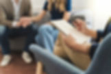 Eye-level view of a cozy counseling room with two chairs and soft lighting