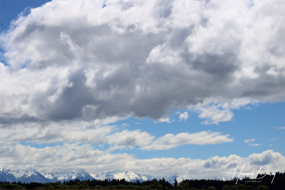 clouds-mtns-HannahDavey.png