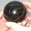 Thumbnail: Garnet sphere with anthophyllite