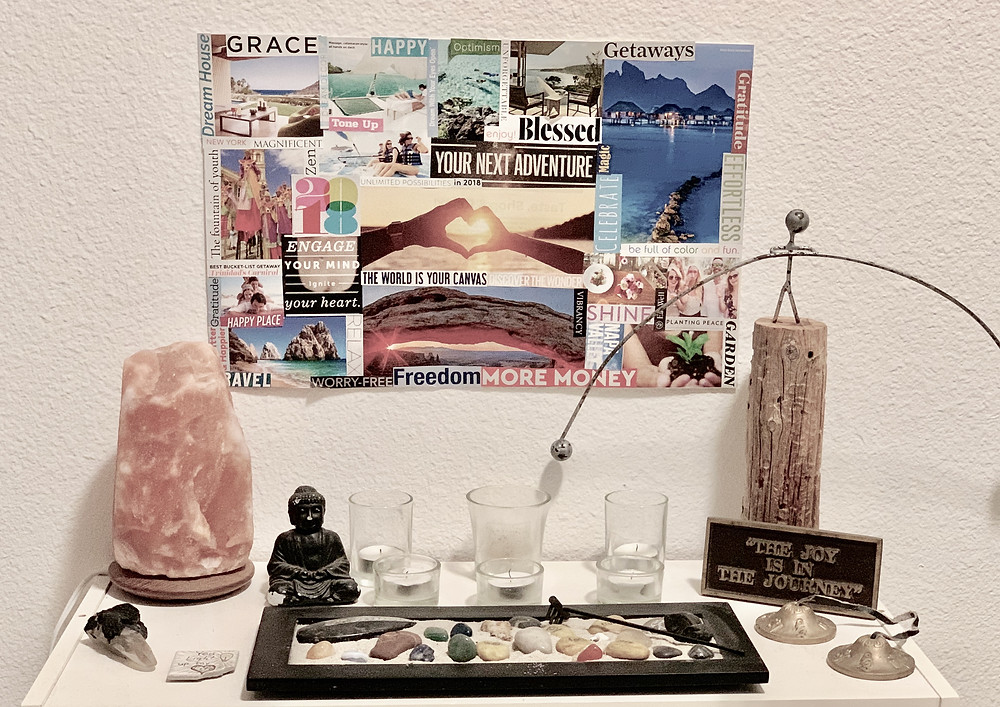 Vision Board hanging above a Mediation Alter with Buddha and Salt Lamp