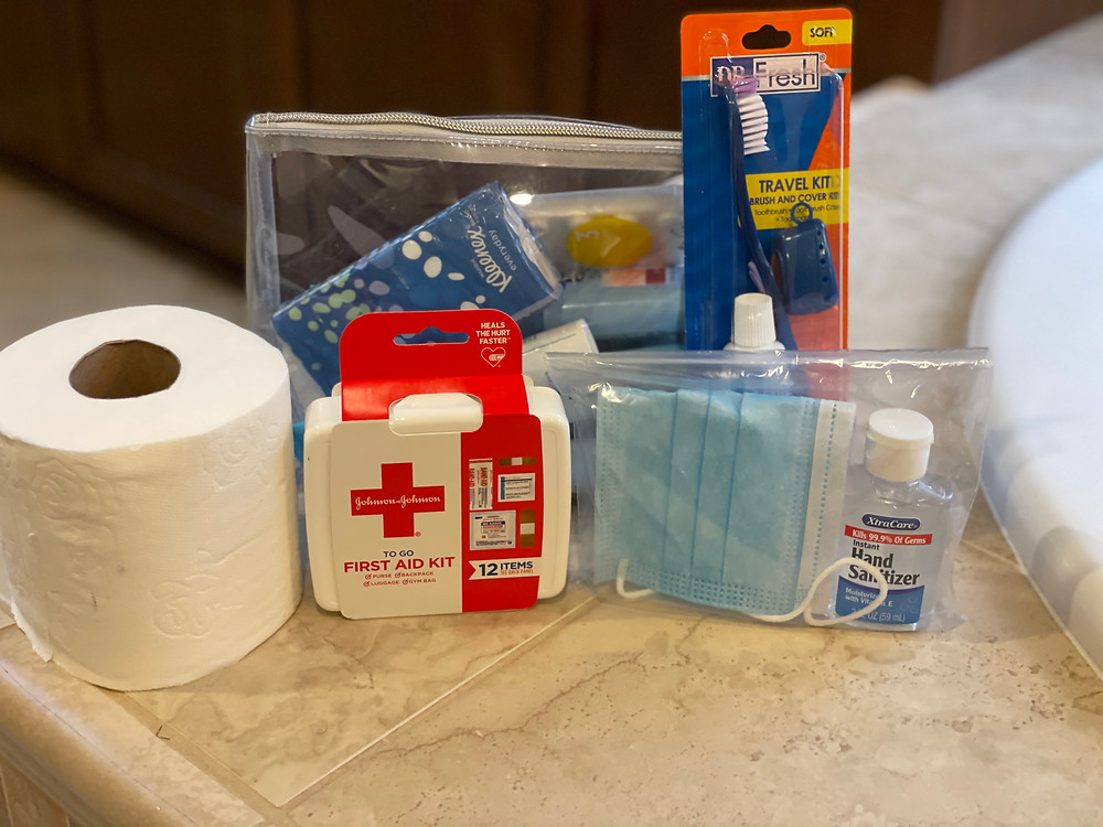 First aid kit, mask, toilet paper other necessities