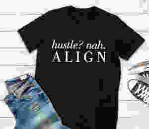 Black t-shirt with align quote with jeans and tennis shoes