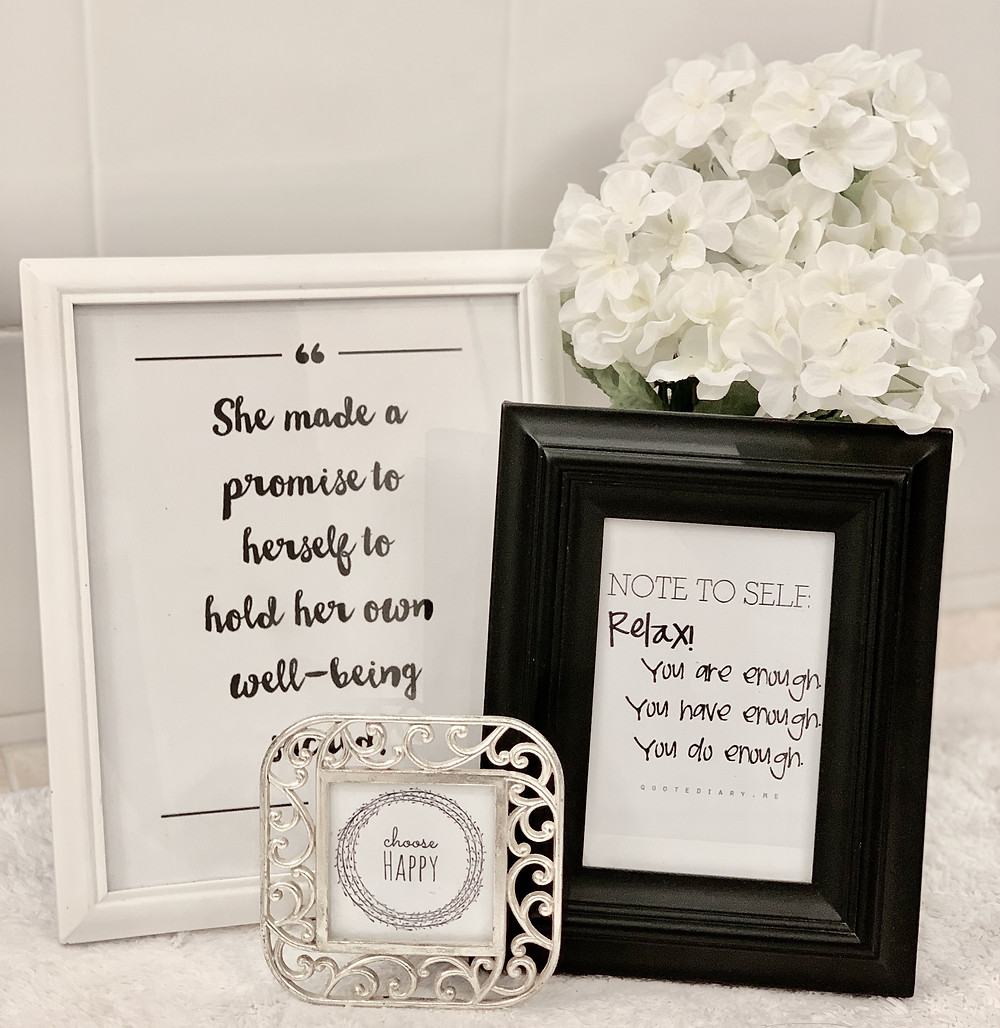 Framed inspirational quotes with white flowers
