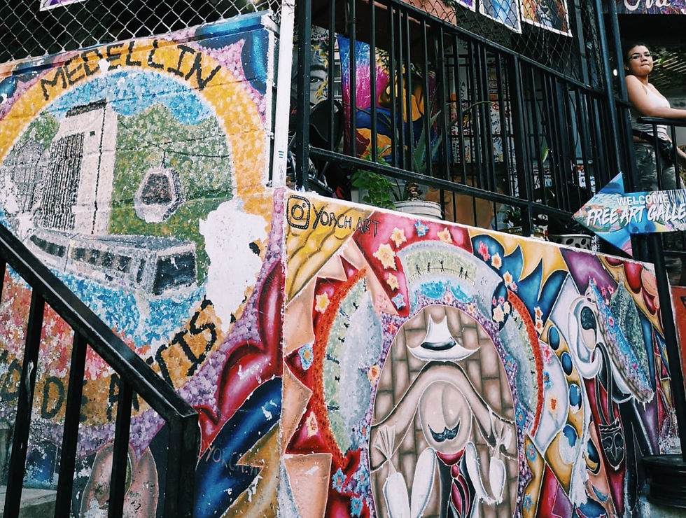 Colorful street art mural in Comuna 13, symbol of Medellín's transformation.