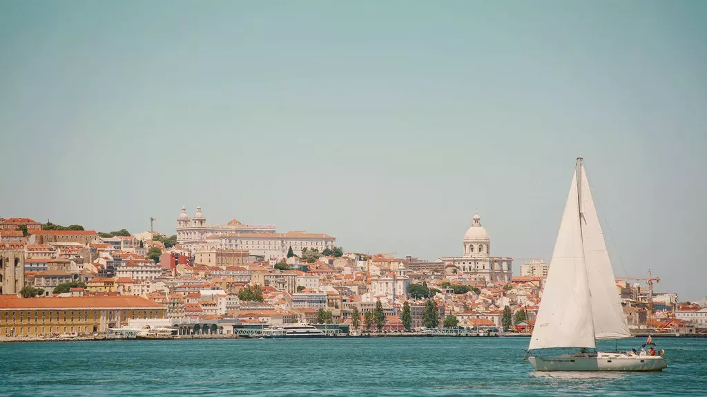 portugal-small-group-travel-tour-sunset-cruise-tagus-river.webp