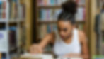 a girl studying in library