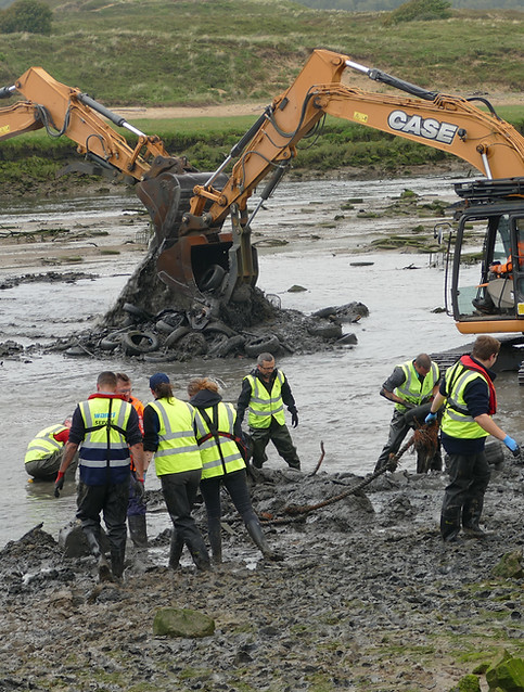 Excavators removing tyres from the Ogmore River