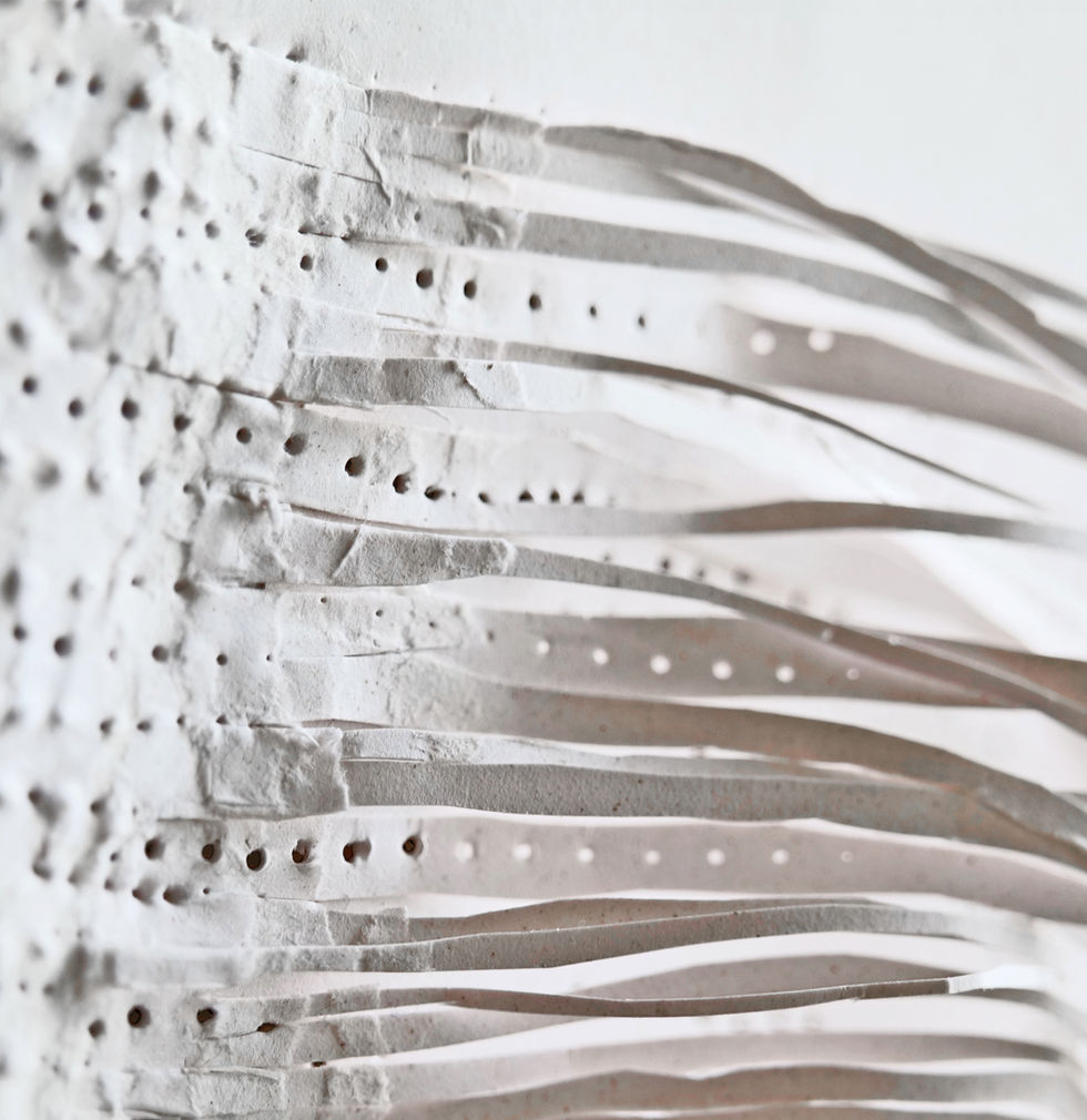 Seaweed-based paper sculpture exploring organic wave forms created by paper artist Anna Normand