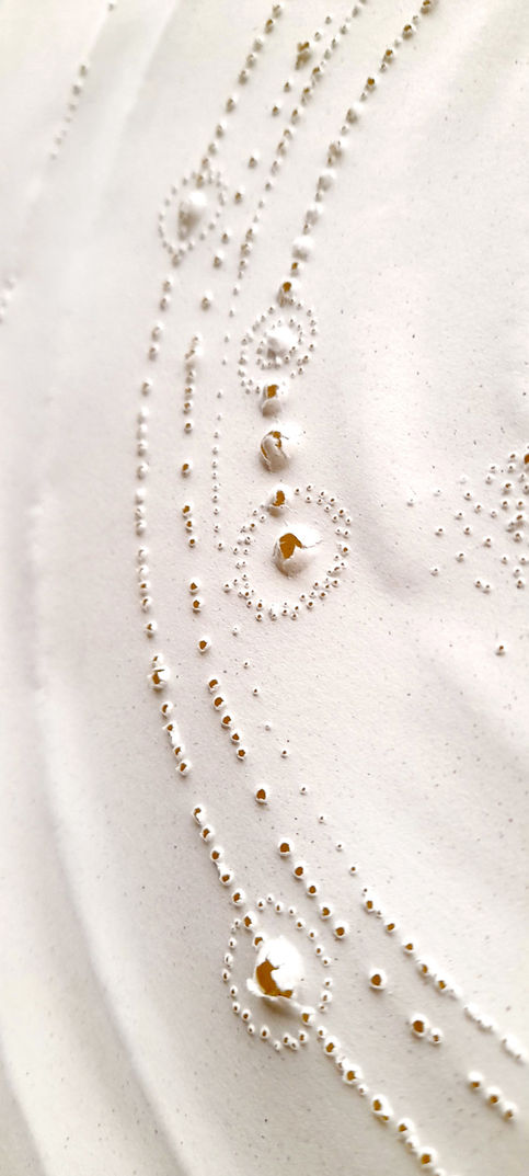 Paper sculpture created from orange peel biomaterial by paper artist Anna Normand