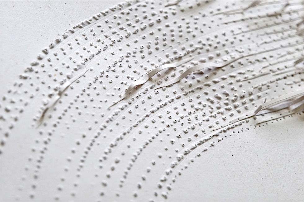 Seaweed-based paper sculpture exploring organic wave forms created by paper artist Anna Normand