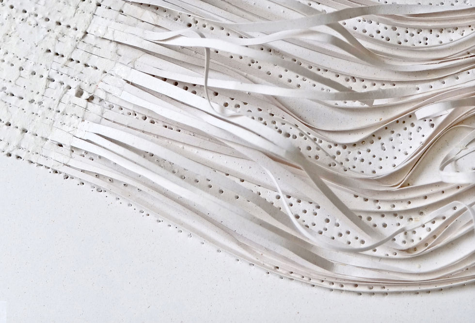 Seaweed-based paper sculpture exploring organic wave forms created by paper artist Anna Normand