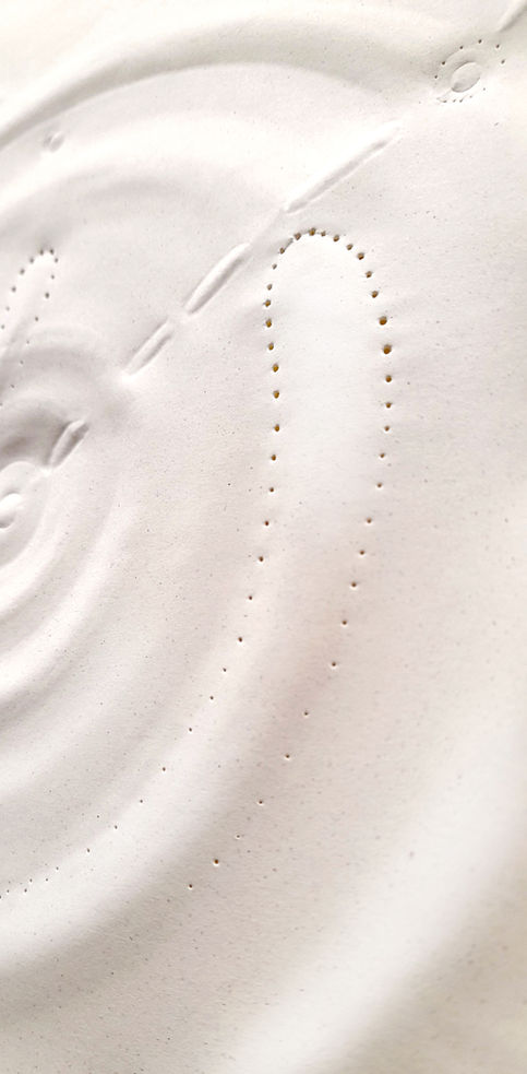 Paper sculpture created from orange peel biomaterial by paper artist Anna Normand