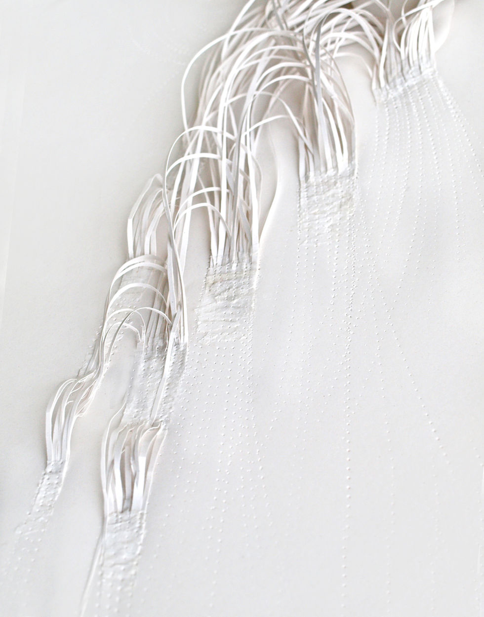 Seaweed-based paper sculpture exploring organic wave forms created by paper artist Anna Normand