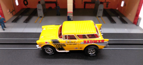 Voiture Miniature Auto World Chevrolet Nomad 1957 - Jaune Orange - Échelle HO