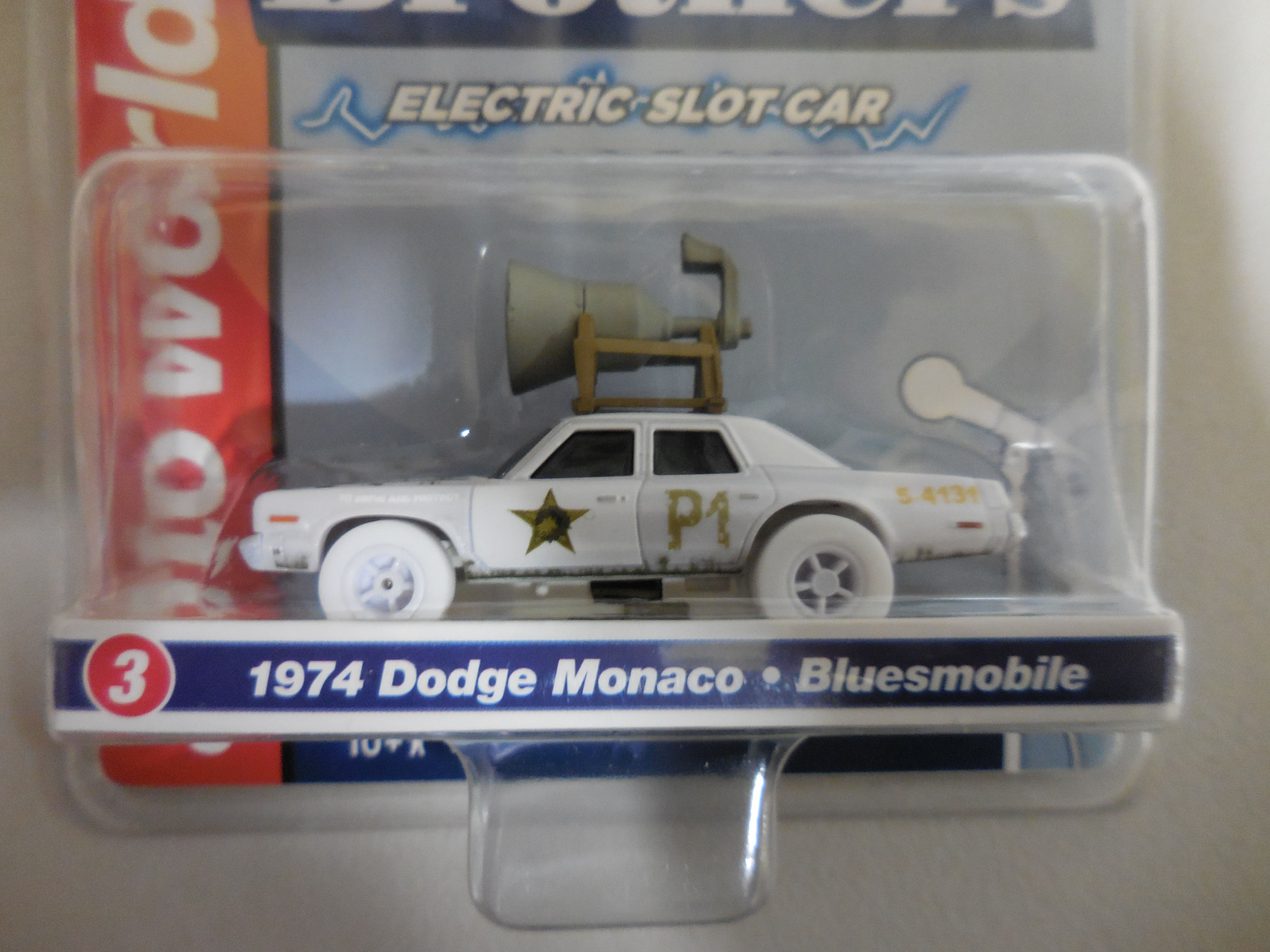 Auto World I Wheels '74 Dodge Monaco Blues Brothers Rel. Silver Screen SC409