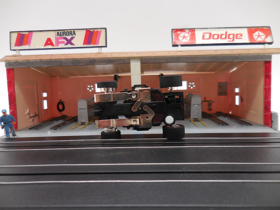 Thumbnail: Auto World 1 New Xtraction Ultra G Chassis with Chrome Rims BF Goodrich Tires