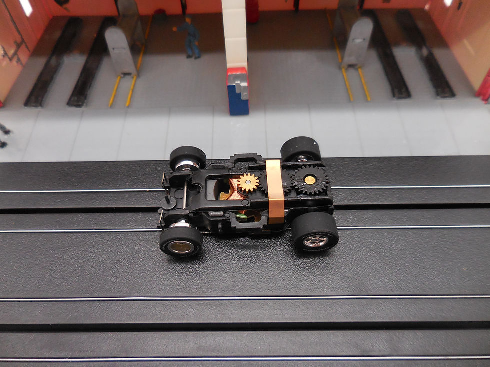 Thumbnail: Auto World 1 New Xtraction Ultra G Chassis with Chrome Rims BF Goodrich Tires