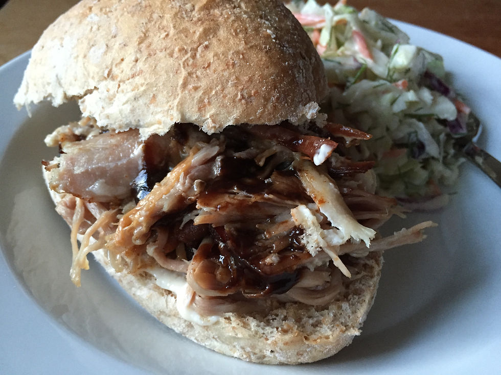 A slow cooked pork butt is perfect to shred for Pulled Pork Sandwiches